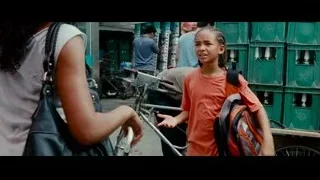 young girl standing by green truck — The Karate Kid