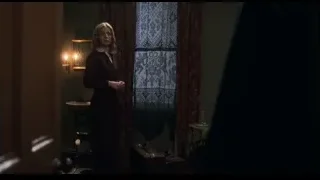 Woman standing in dark room by window — Peaky Blinders