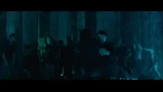 people walking on street at night — John Wick: Chapter 4