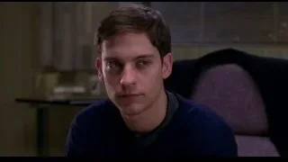 young man sitting in office chair — Spider Man