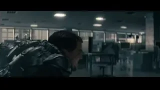 person in futuristic helmet with glowing red eyes — Superman: Man of Steel