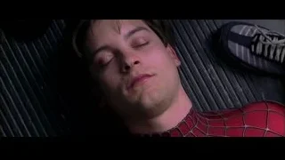 man in Spiderman suit lying down — Spider Man 2