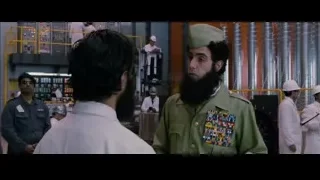 Two men conversing in a factory — The Dictator