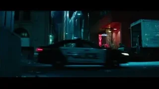 city street with hotel neon sign — Deadpool 2