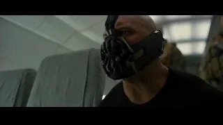man's face with futuristic black mask — Batman: The Dark Knight Rises