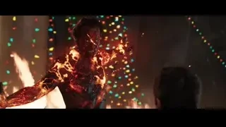 person in front of large fire — Iron Man 3