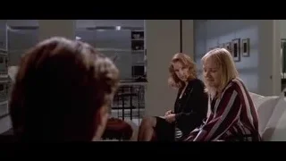 man in tuxedo smiling at city night view — American Psycho