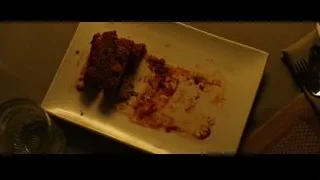 meatloaf with red sauce on white plate — Whiplash