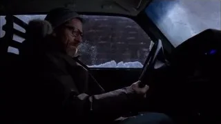 man with beard driving car in snow — Breaking Bad