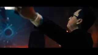 Man in suit pointing gun — John Wick: Chapter 4