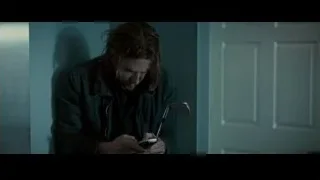 Person holding phone in dark room — Limitless