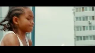 young girl with braids on balcony — The Karate Kid