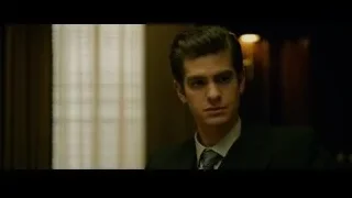 Young man in suit with serious expression — The Social Network