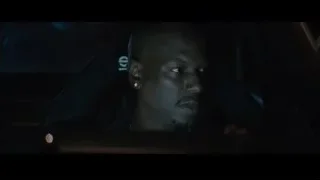 man in car looking out window — Furious Seven