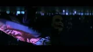 Joker in dramatic pose with cape — Batman: The Dark Knight