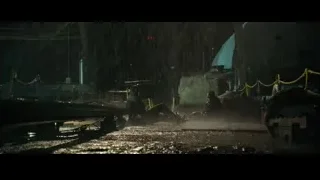 two people in dark rainy tunnel — John Wick