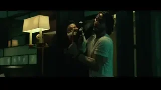 Distressed woman and man with beard — John Wick