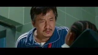 older Asian man looking at young boy — The Karate Kid