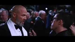 man in tuxedo talking on red carpet — Iron Man