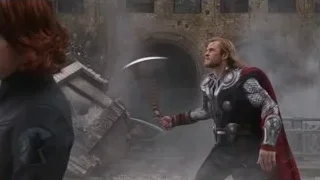 woman in leather jacket by destroyed building — The Avengers