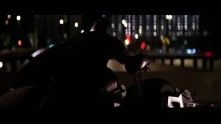 person riding motorcycle on street at night — Batman: The Dark Knight