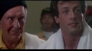 two men talking in yellow shirt and turban — Rocky III