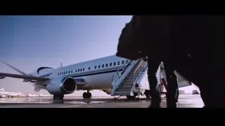Men boarding airplane on tarmac — Iron Man