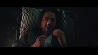 Man smoking cigarette in dark room — Iron Man