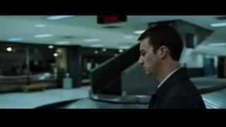man in suit looking at red car — Fight Club
