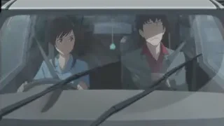 man and woman sitting in car — Weathering with You
