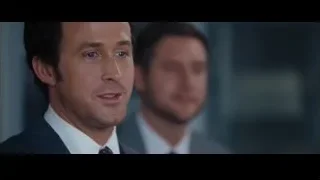 two men in suits looking at cityscape — The Big Short