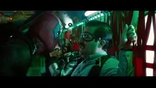 Deadpool with gun in dimly lit room — Deadpool 2