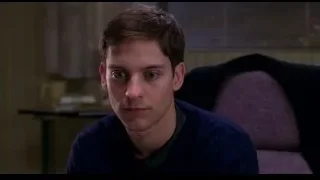young man sitting in office chair — Spider Man