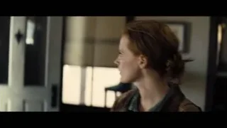 man in black jacket standing in hallway — Interstellar