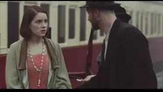 Woman and man with gun on train platform — Peaky Blinders