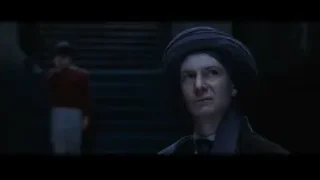 man in black turban by staircase — Harry Potter and the Philosophers Stone