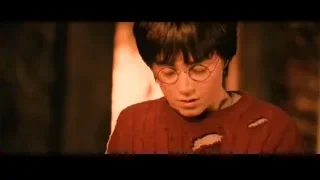 young boy in dimly lit room — Harry Potter and the Philosophers Stone