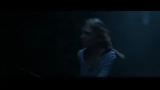 Person walking through dark tunnel with water — Harry Potter and the Goblet of Fire