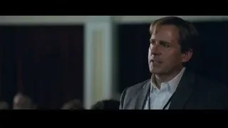 man speaking at podium on stage — The Big Short