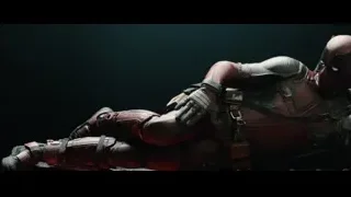 Deadpool lying on back in red suit — Deadpool 2