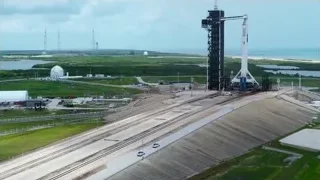Aerial view of crane lifting rocket — Elon Musk: Return to Space