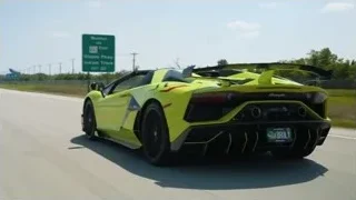 Yellow Lamborghini sports car on highway — Sports Cars