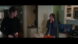 Man cutting fruit in kitchen with woman — The Amazing Spider Man 2