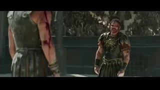 man in ancient armor before a crowd — Gladiator 2