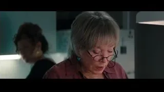 Elderly woman reading paper, deep in thought — The Secret Life of Walter Mitty