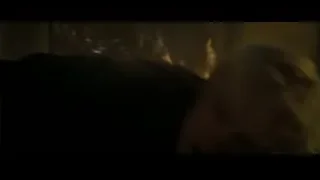 person lying distressed on ground in dark room — Harry Potter and the Deathly Hallows 2