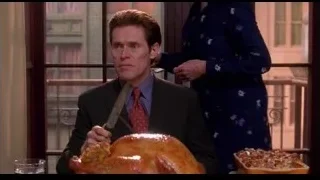 man carving turkey at table — Spider Man