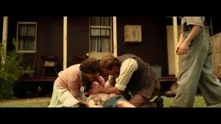 Man carrying woman on his back — Hacksaw Ridge