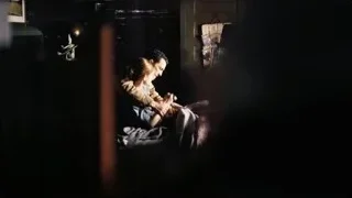 man sitting on bed deep in thought — Interstellar