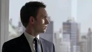 young man in suit by city skyline — Suits